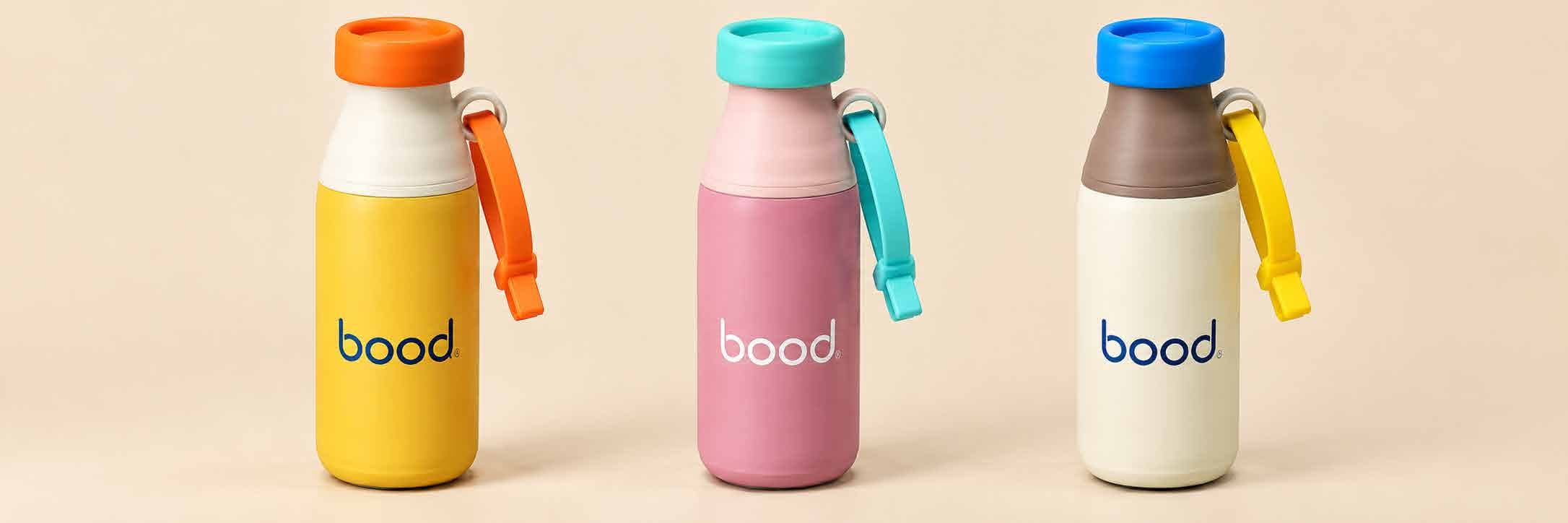 bood bottle in yellow with an orange cap and carry strap